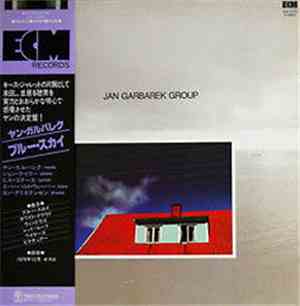 Jan Garbarek Group - Photo With Blue Sky, White Cloud, Wires, Windows And A Red Roof