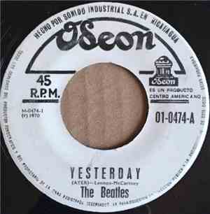 The Beatles - Yesterday = Ayer / She Loves You = Ella Te Ama