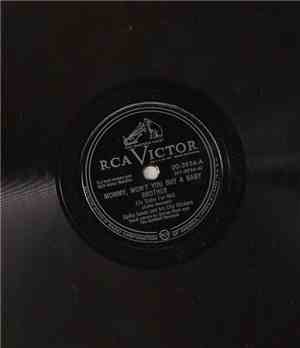 Spike Jones And His City Slickers - Mommy, Won't You Buy A Baby Brother  /  Rudolph The Red-Nosed Reindeer