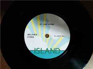 Melanie Fiona - Sad Songs / Somebody Get Me / Island Boy